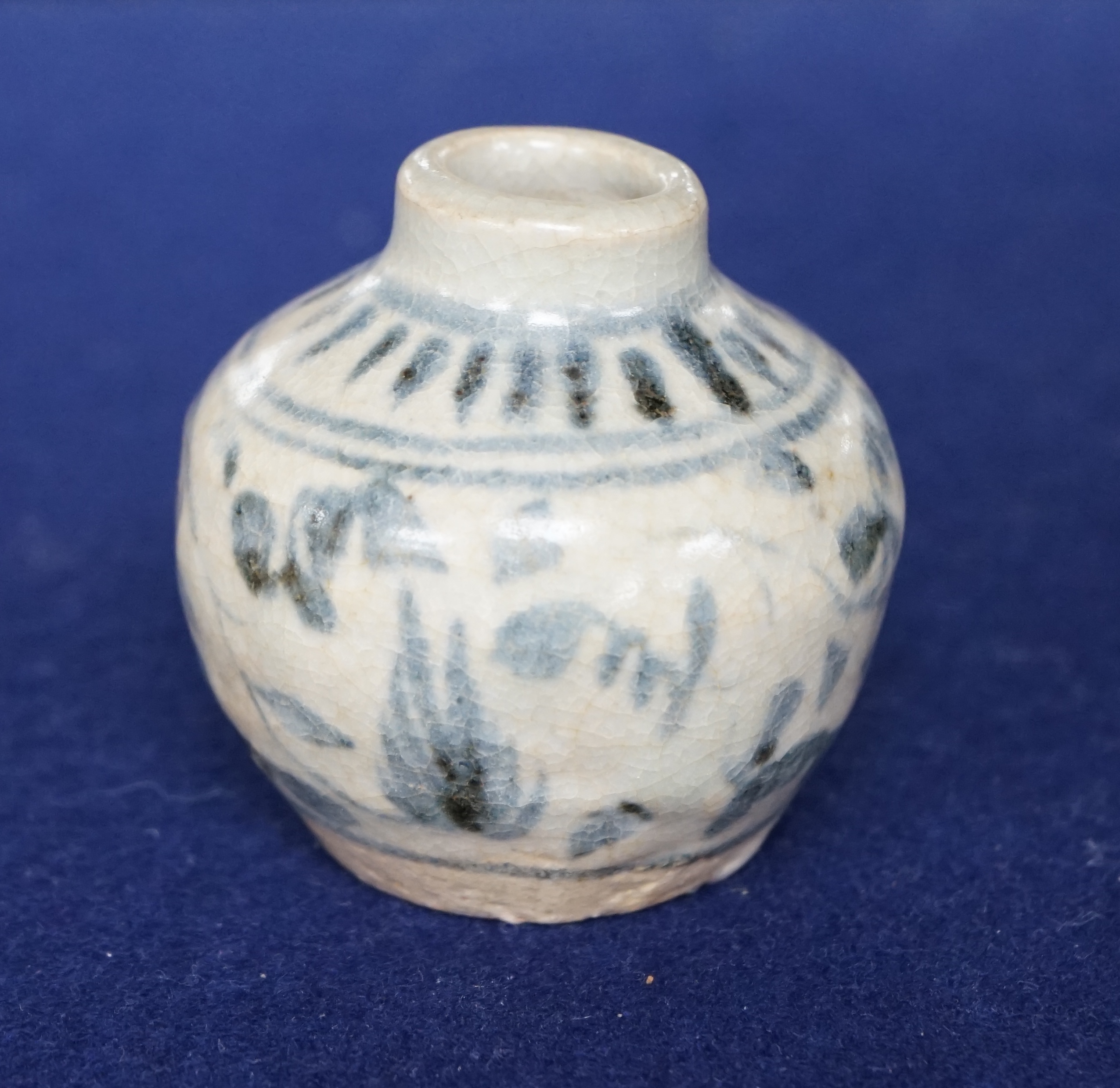 A Chinese blue and white jarlet and a tang dynasty glazed jarlet, 9cm. Condition - commensurate with age